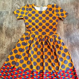 LuLaRoe Amelia dress in medium (yellow pattern)